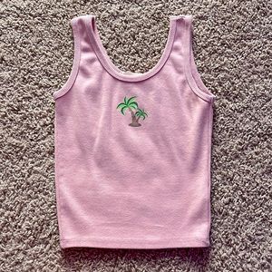 Cropped Tank Top. Comes true to size. Form fitting.